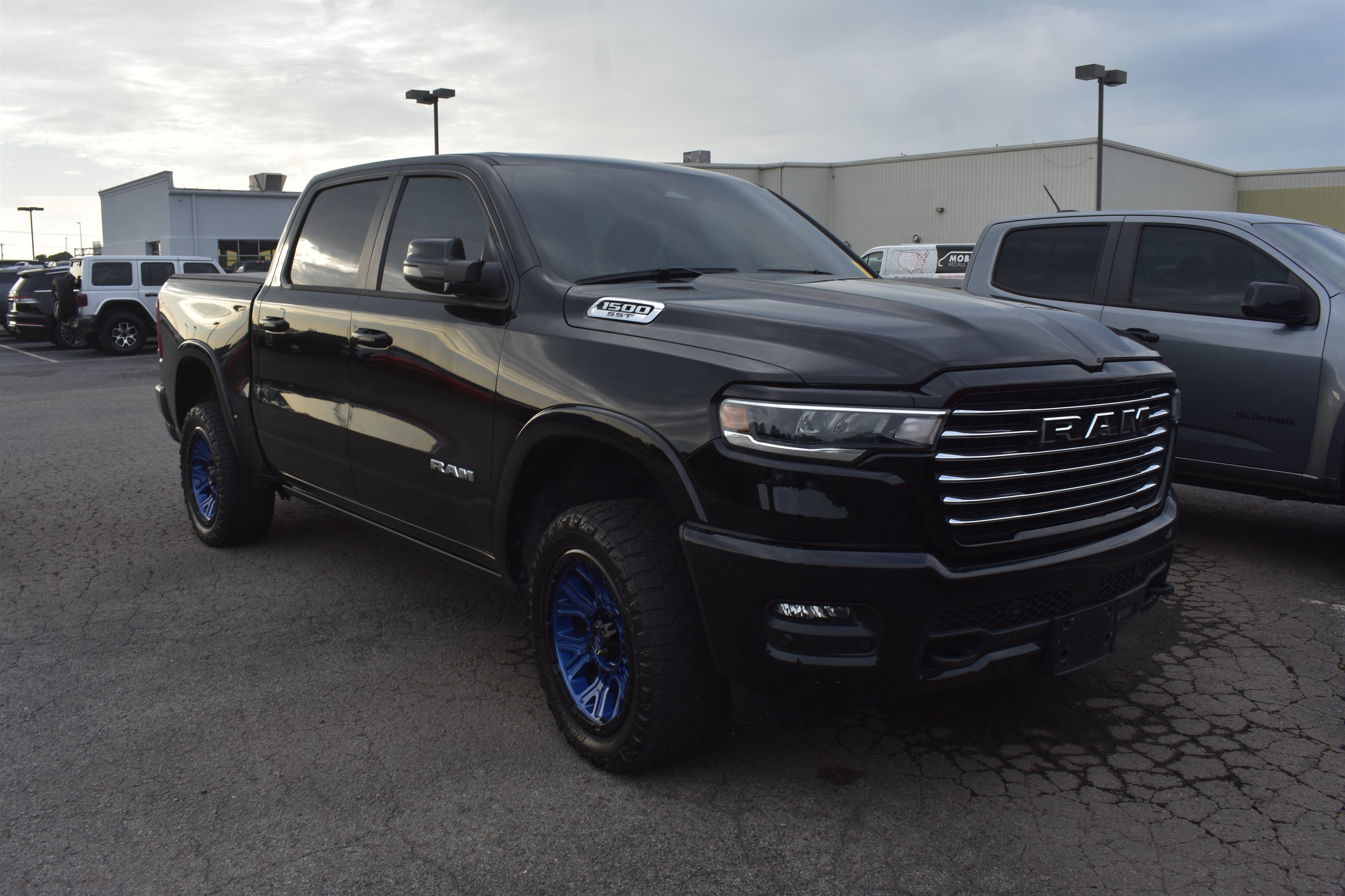 Used 2025 Diamond Black Crystal Pearlcoat Ram Laramie image 2