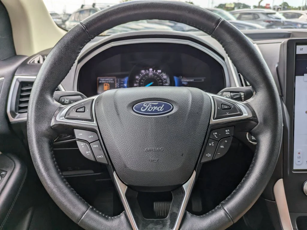Certified Used 2024 Agate Black Metallic Ford SEL image 28