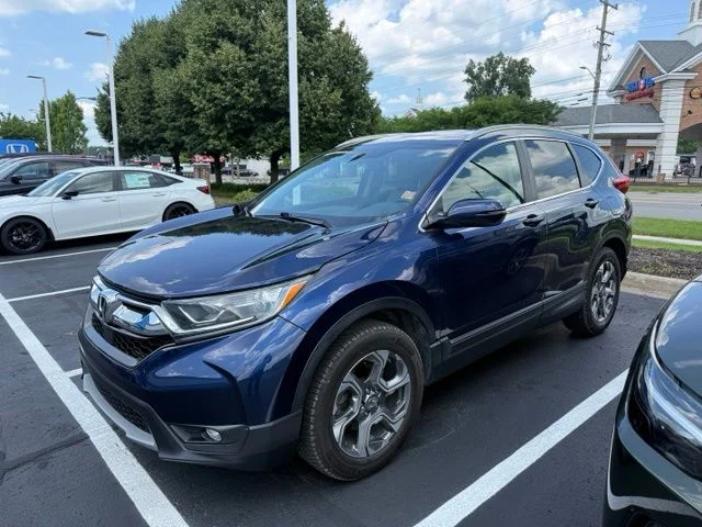 Used 2019 Obsidian Blue Pearl Honda EX-L image 1