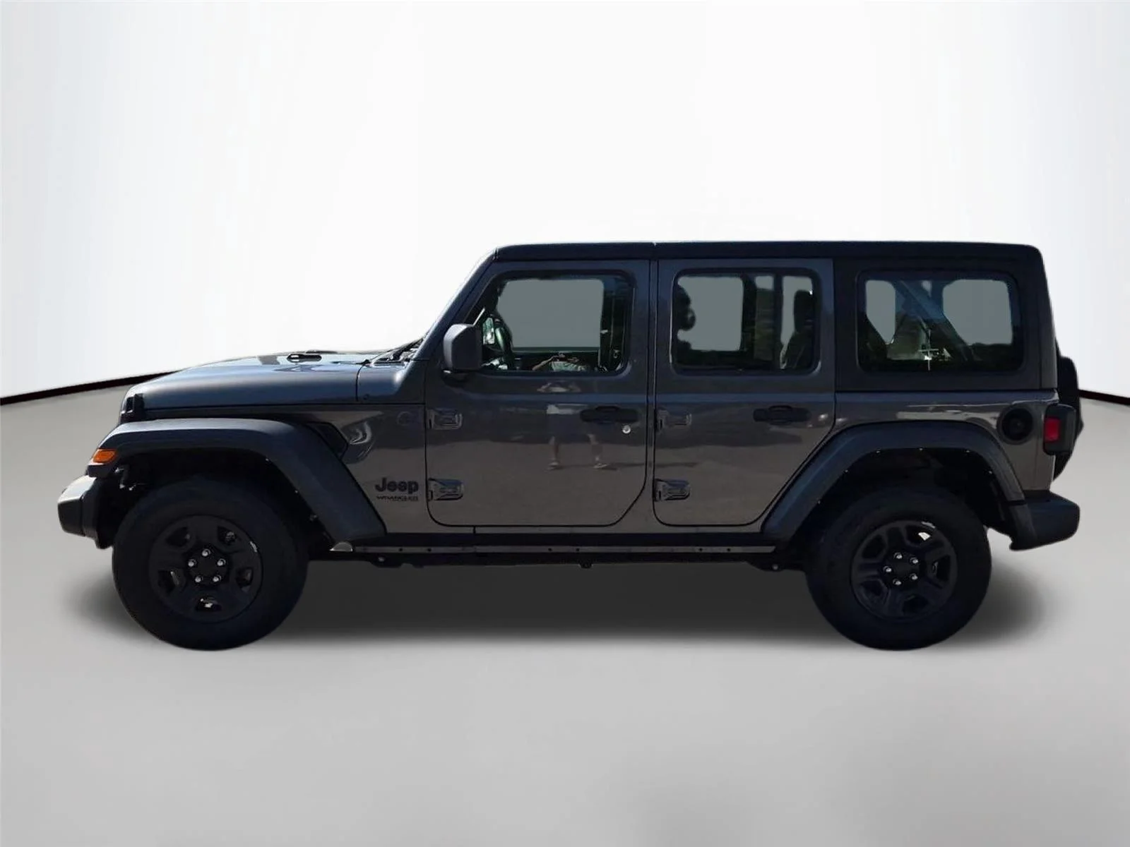 Used 2022 Granite Crystal Metallic Clearcoat Jeep Unlimited Sport image 2