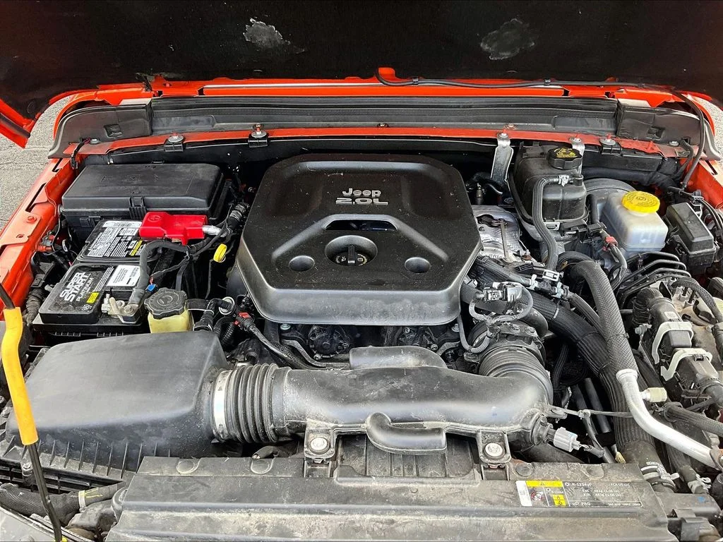 Used 2018 Orange Jeep Unlimited Sahara image 10