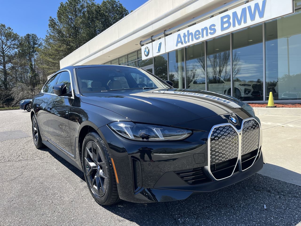 Used 2026 Black Sapphire Metallic BMW eDrive40 image 1
