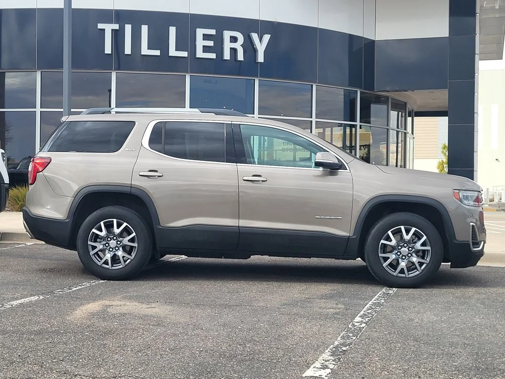 Used 2023 LIGHT STONE METALLIC GMC SLT image 1