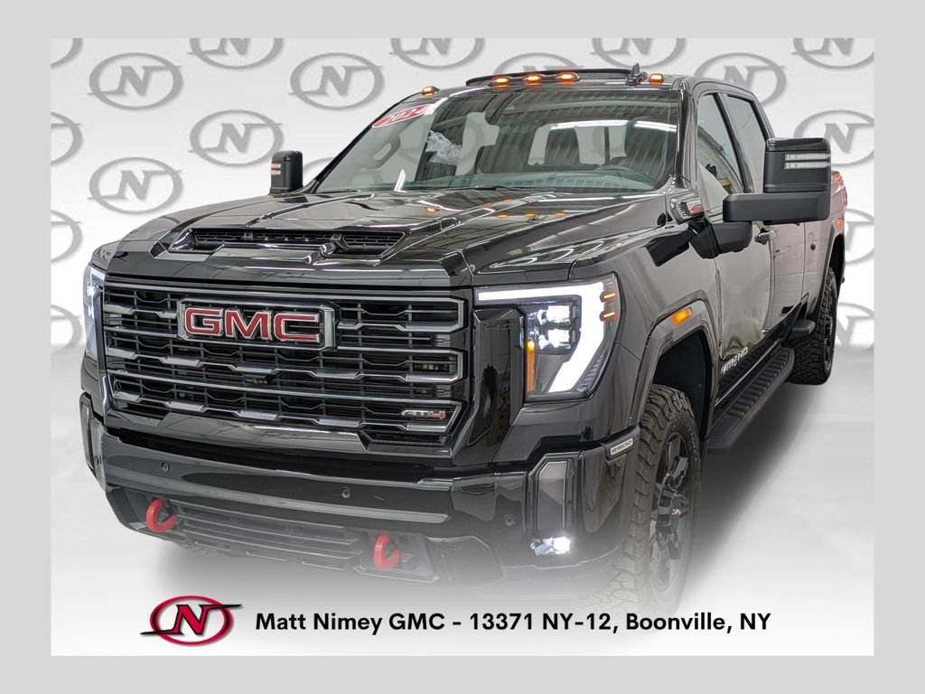 Used 2024 Black GMC AT4 image 1
