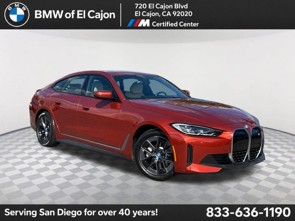 Used 2023 Orange BMW eDrive35 image 1