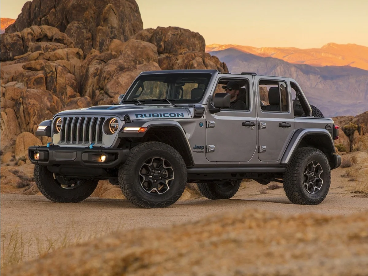Used 2021 Green Jeep Unlimited Sahara 4xe image 1