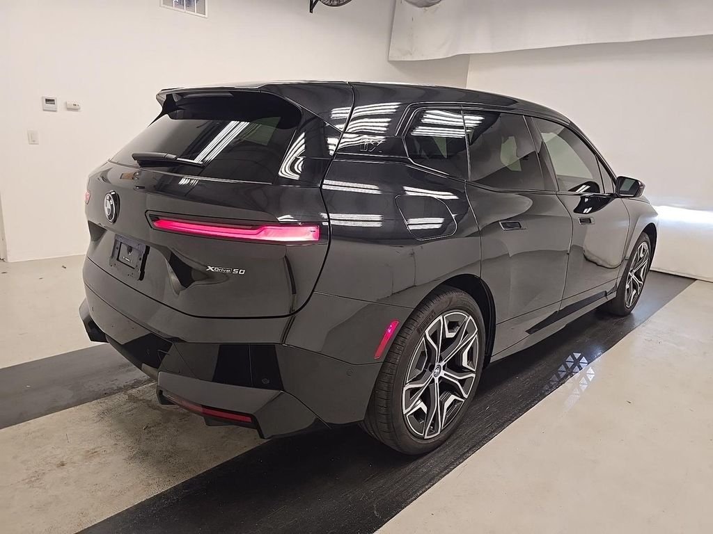 Certified Used 2024 Black BMW xDrive50 image 2
