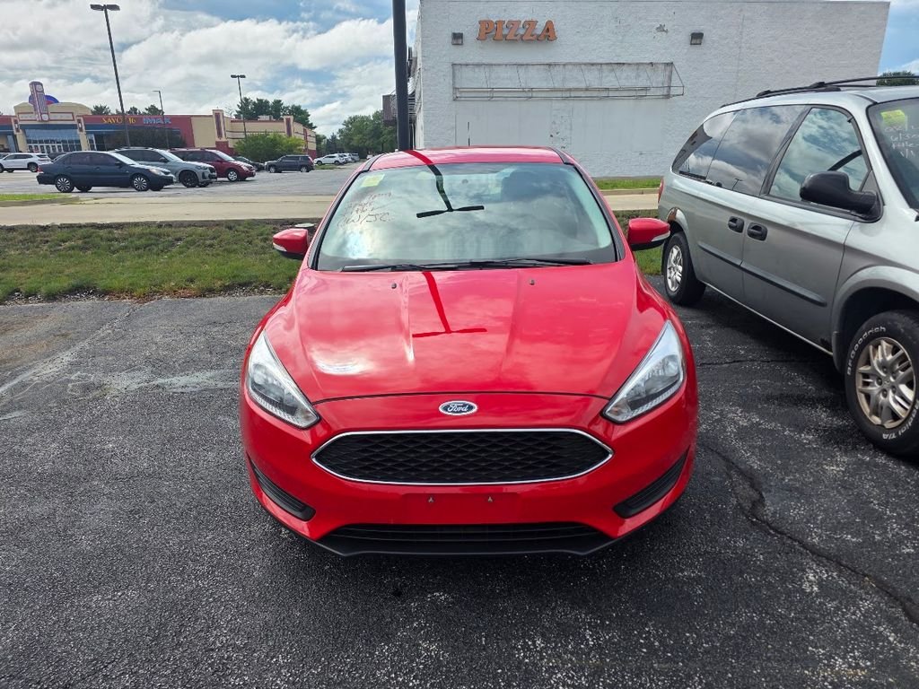 Used 2016 Race Red Ford SE image 1