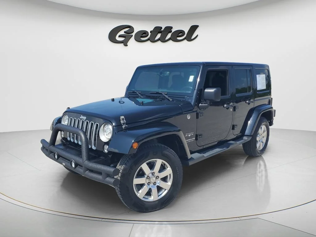 Used 2017 Black Jeep Sahara 4x4 image 1