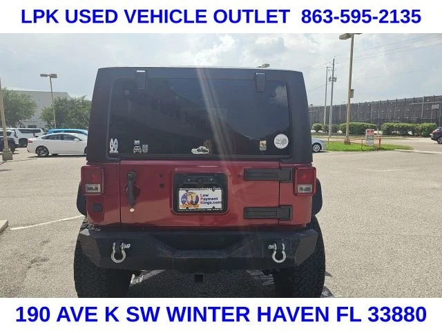 Used 2012 Red Jeep Sport image 4