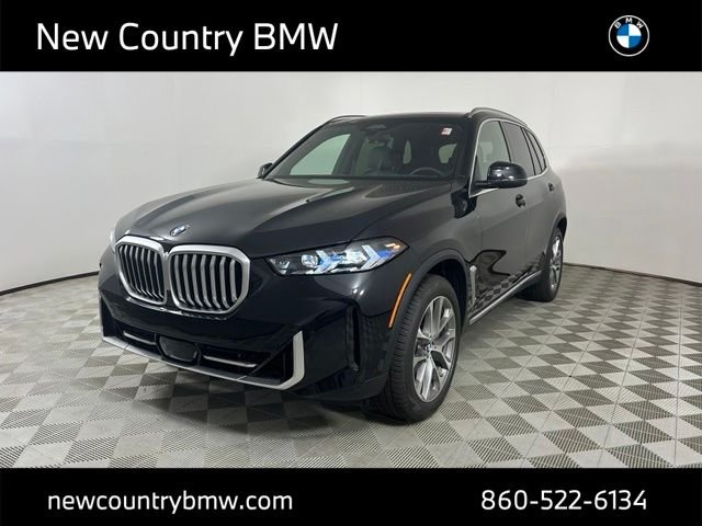New 2026 Black Sapphire Metallic BMW xDrive40i image 3