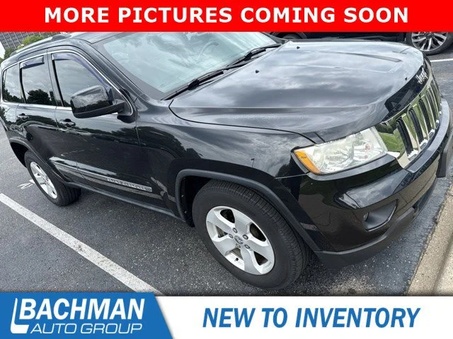 Used 2012 Brilliant Black Crystal Pearl Jeep Laredo image 1