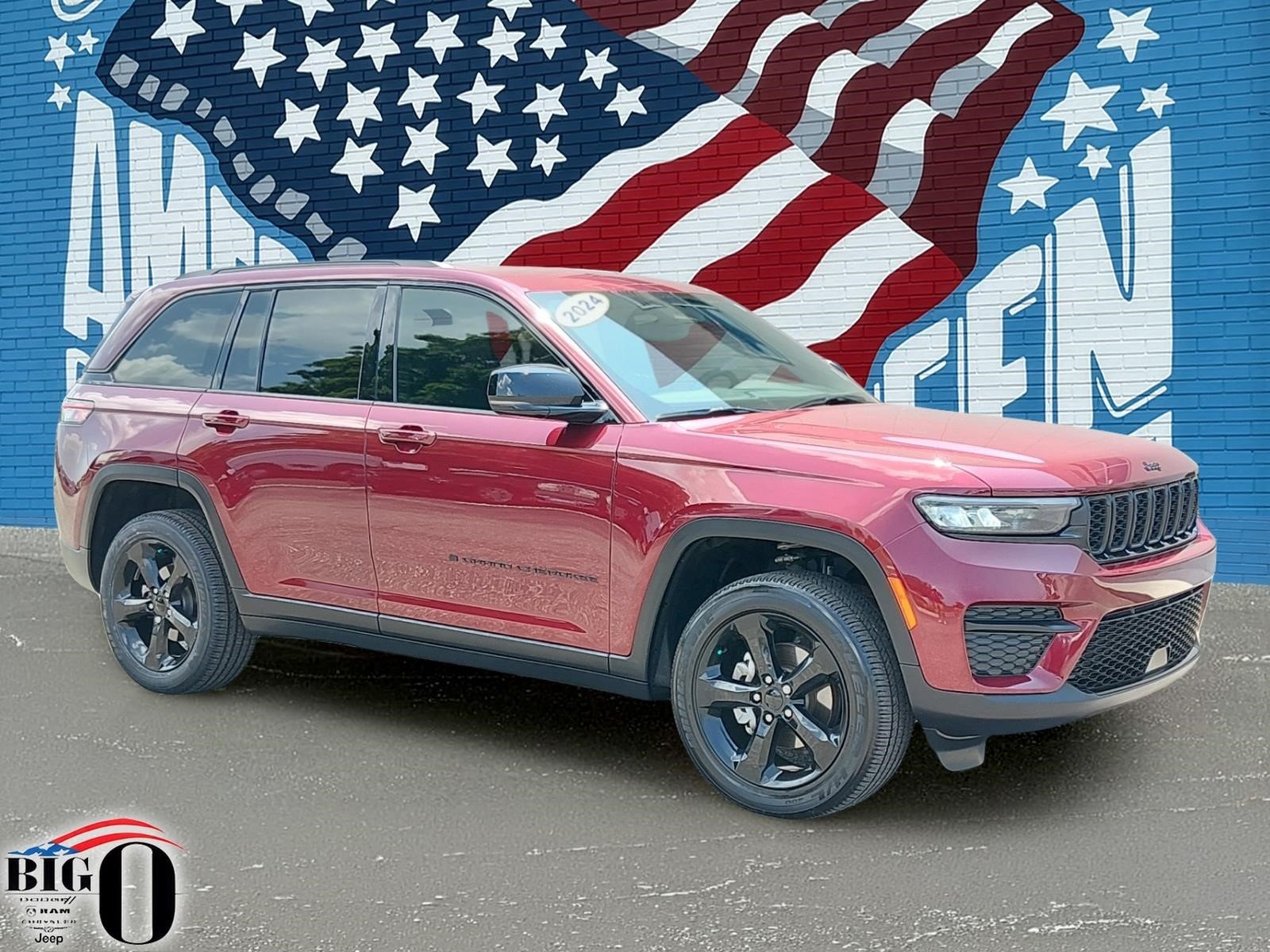 Certified Used 2024 BURGUNDY Jeep Laredo image 1