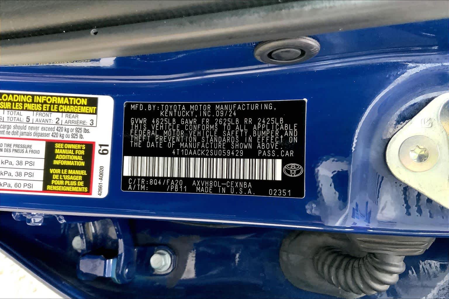 Used 2025 Reservoir Blue Toyota LE image 34