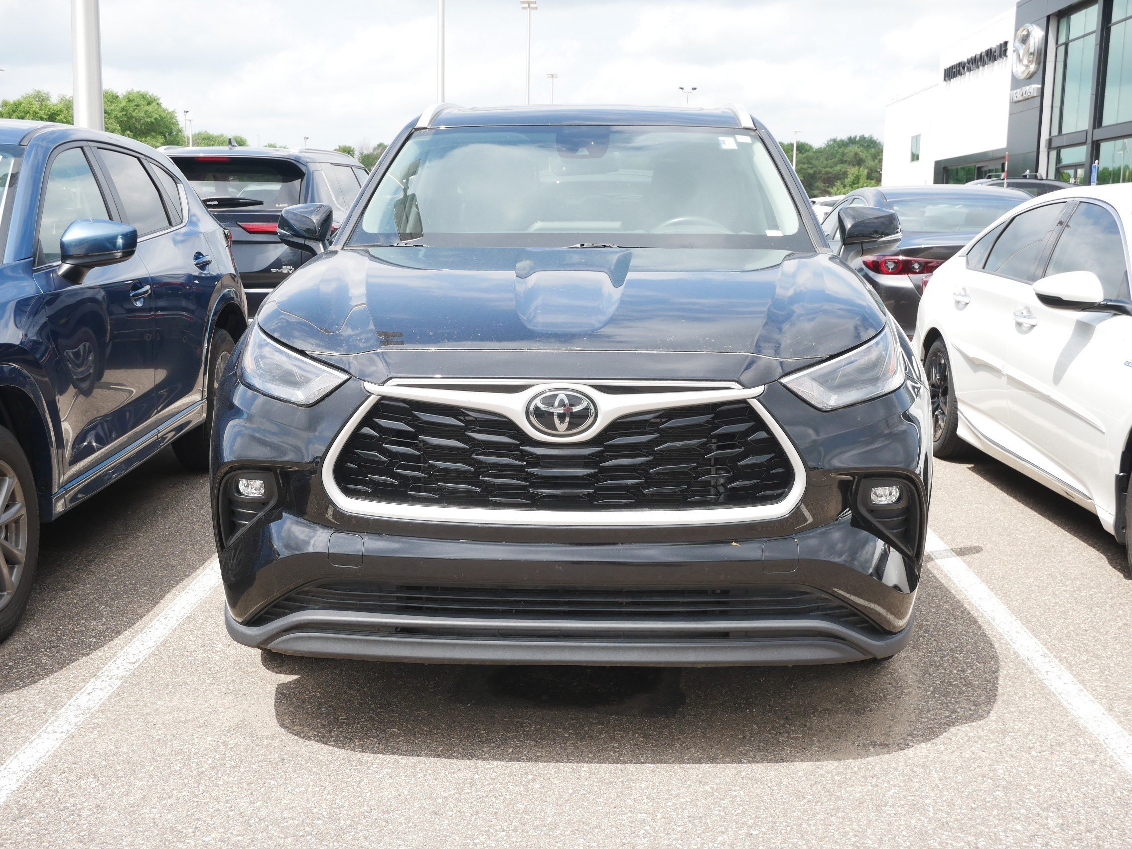 Used 2024 Midnight Black Metallic Toyota XLE image 2