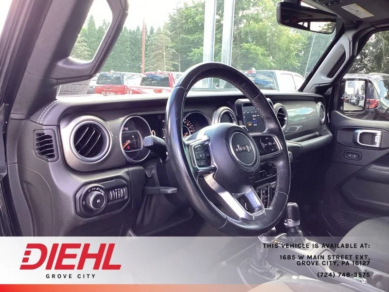 Used 2018 Black Jeep Unlimited Sahara image 17