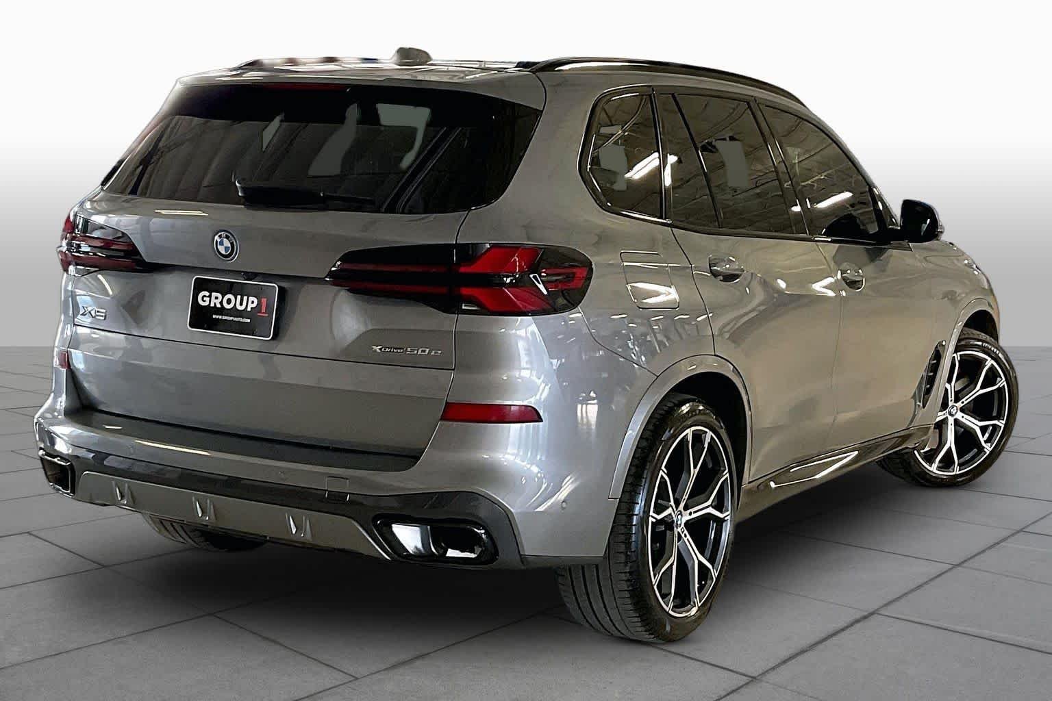 Used 2025 Skyscraper Grey Metallic BMW xDrive50e image 12