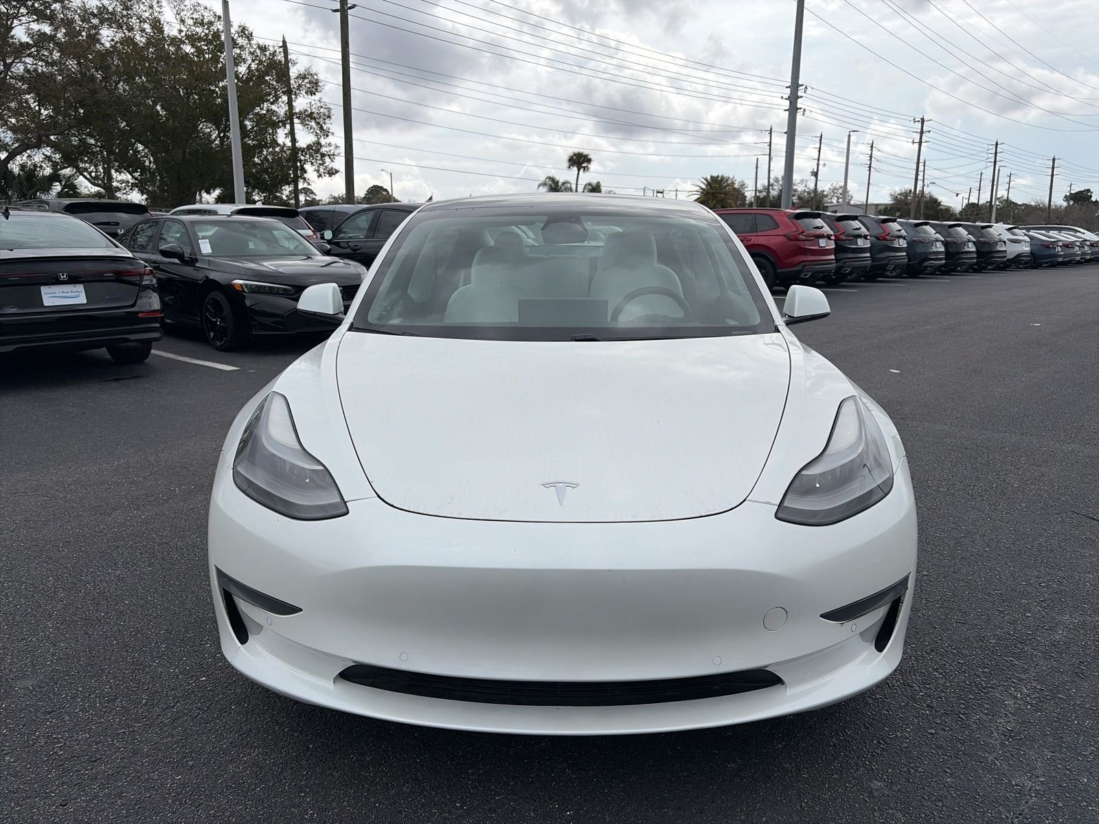 Used 2021 Tesla Model 3 Base with VIN 5YJ3E1EA7MF018671 for sale in Port Richey, FL