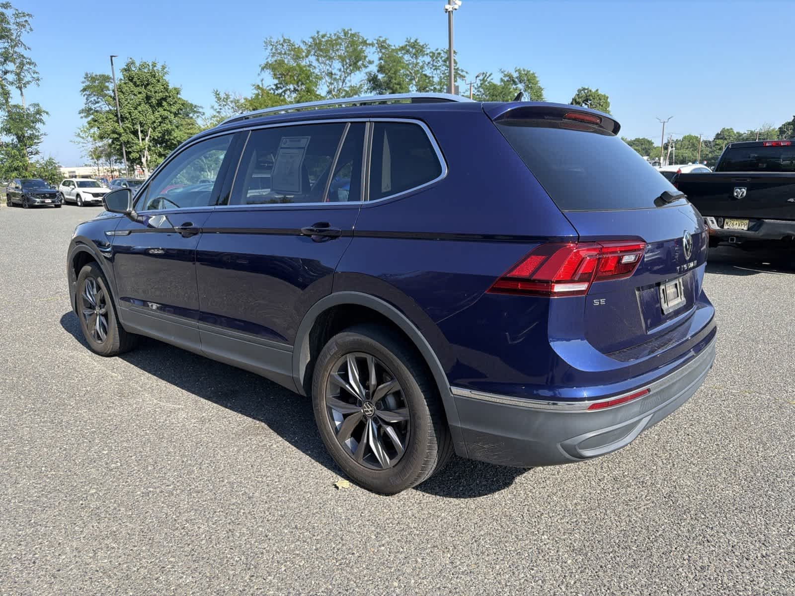 Used 2022 Atlantic Blue Metallic Volkswagen SE image 3