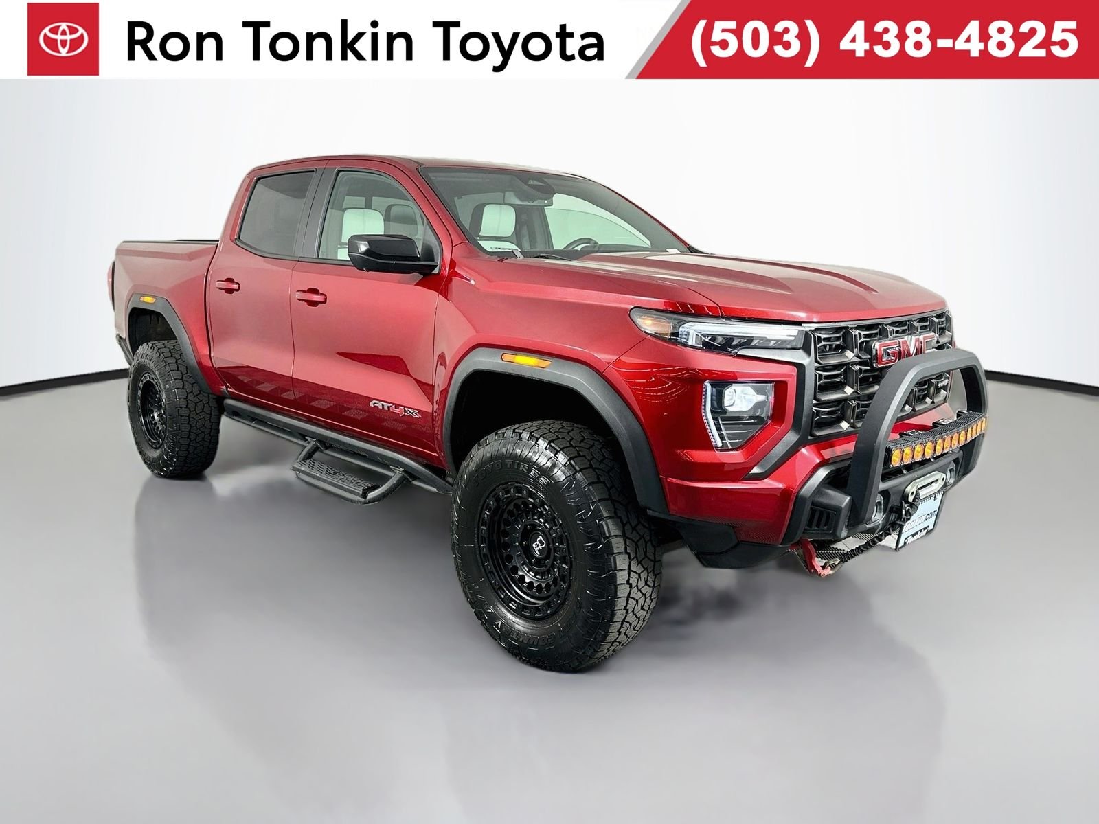 Used 2023 Volcanic Red Tintcoat GMC AT4X image 1