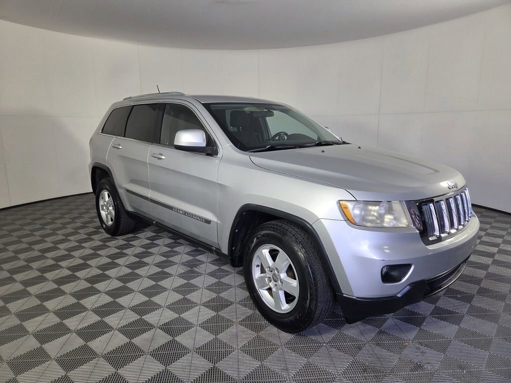 Used 2012 Jeep Grand Cherokee Laredo with VIN 1C4RJEAG8CC119334 for sale in West Palm Beach, FL
