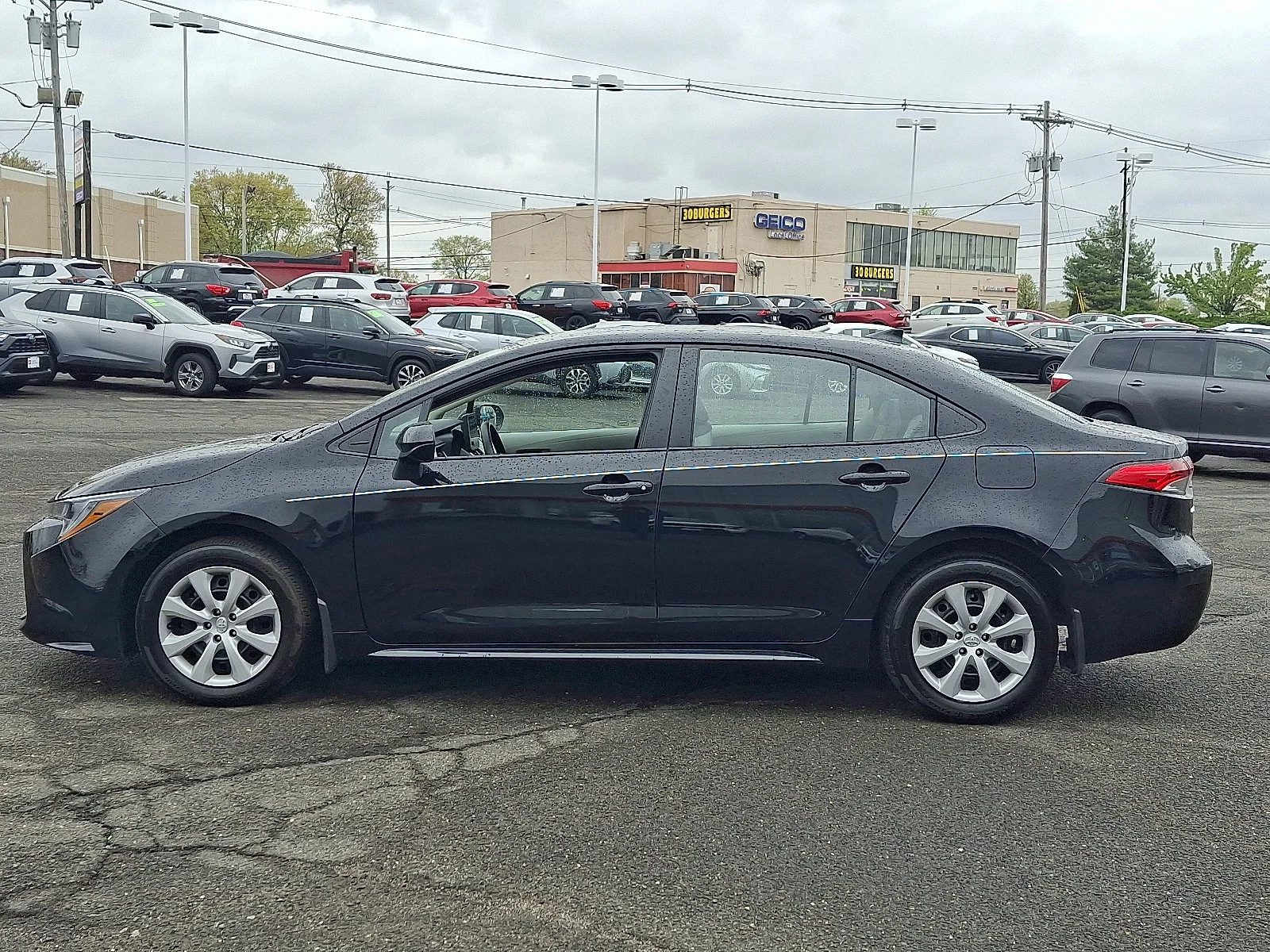 Used 2024 Midnight Black Metallic - 218 Toyota LE image 4