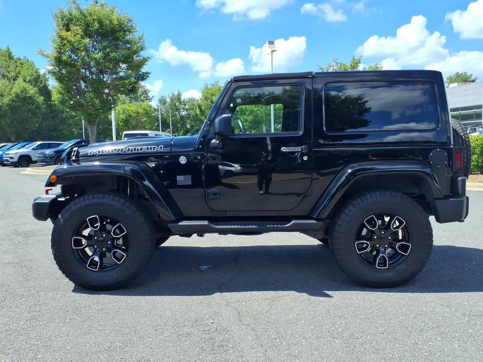 Used 2017 Black Clearcoat Jeep Smoky Mountain image 3