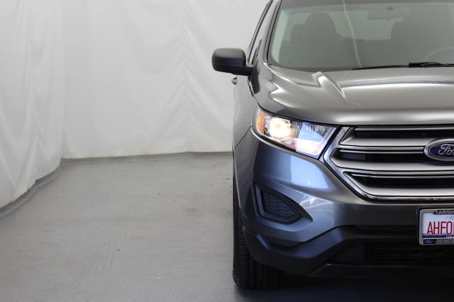 Used 2016 Magnetic Metallic Ford SE image 3