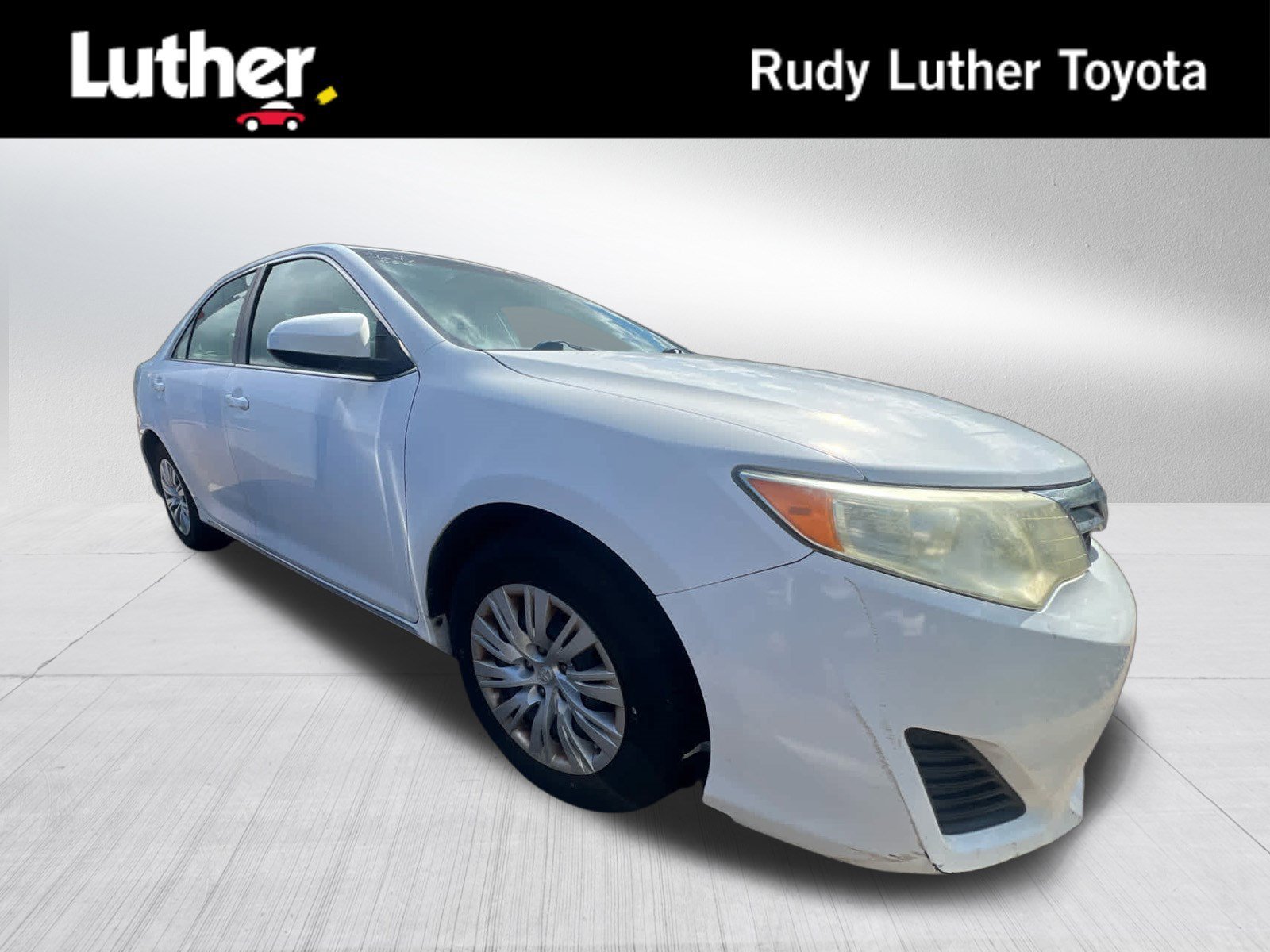 Used 2012 Super White Toyota LE image 1