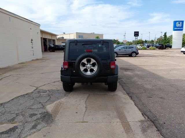 Used 2016 Black Clearcoat Jeep Sahara image 5