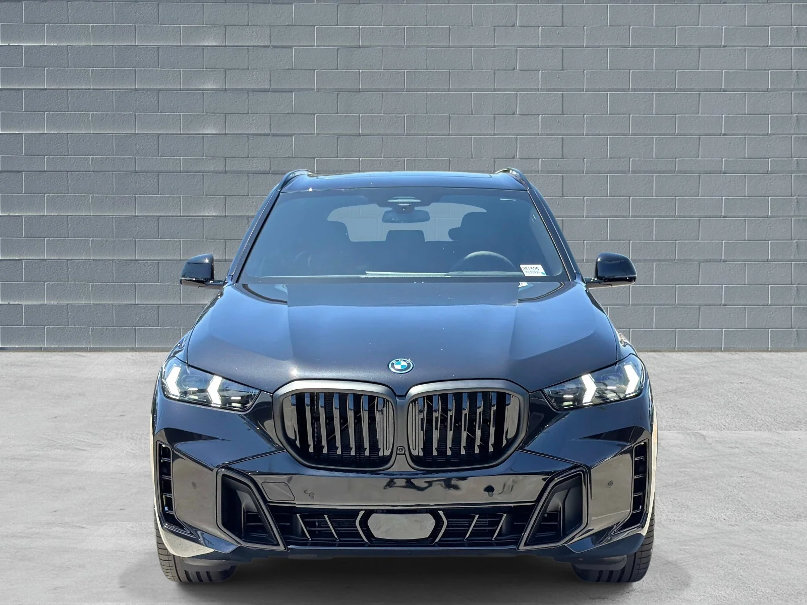New 2026 Black Sapphire Metallic BMW xDrive50e image 2