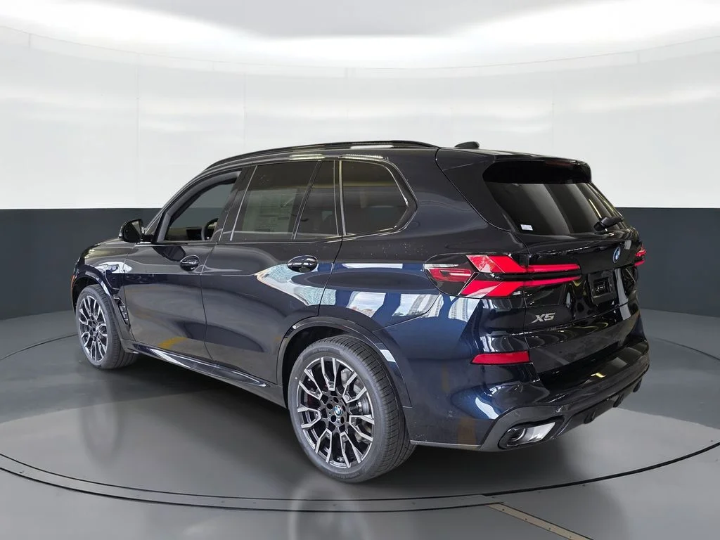 New 2026 Carbon Black Metallic BMW xDrive50e image 4