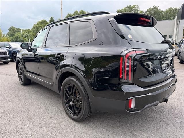 Used 2024 Black Kia EX X-Line image 5