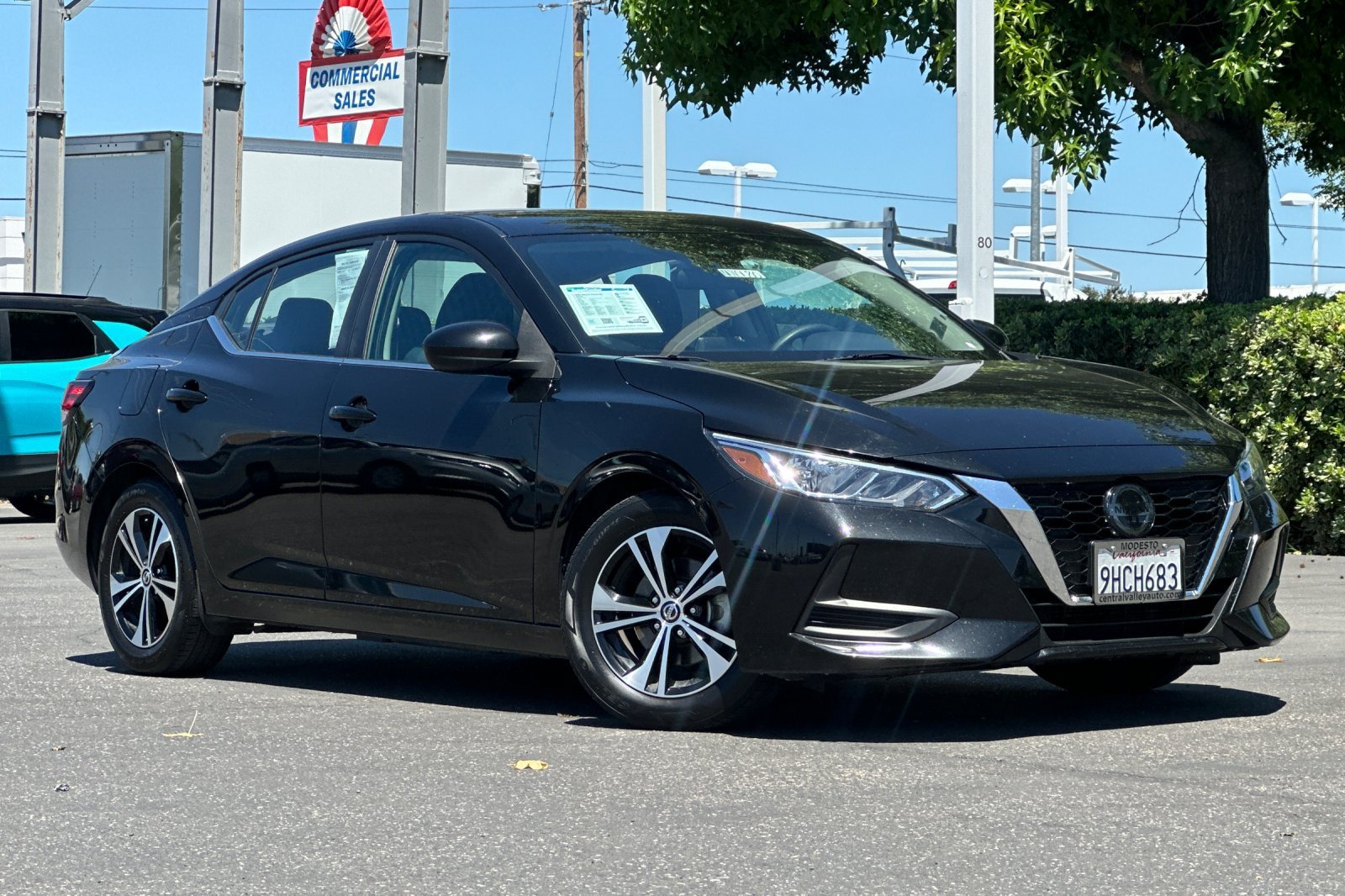 Certified Used 2023 Super Black Nissan SV image 2