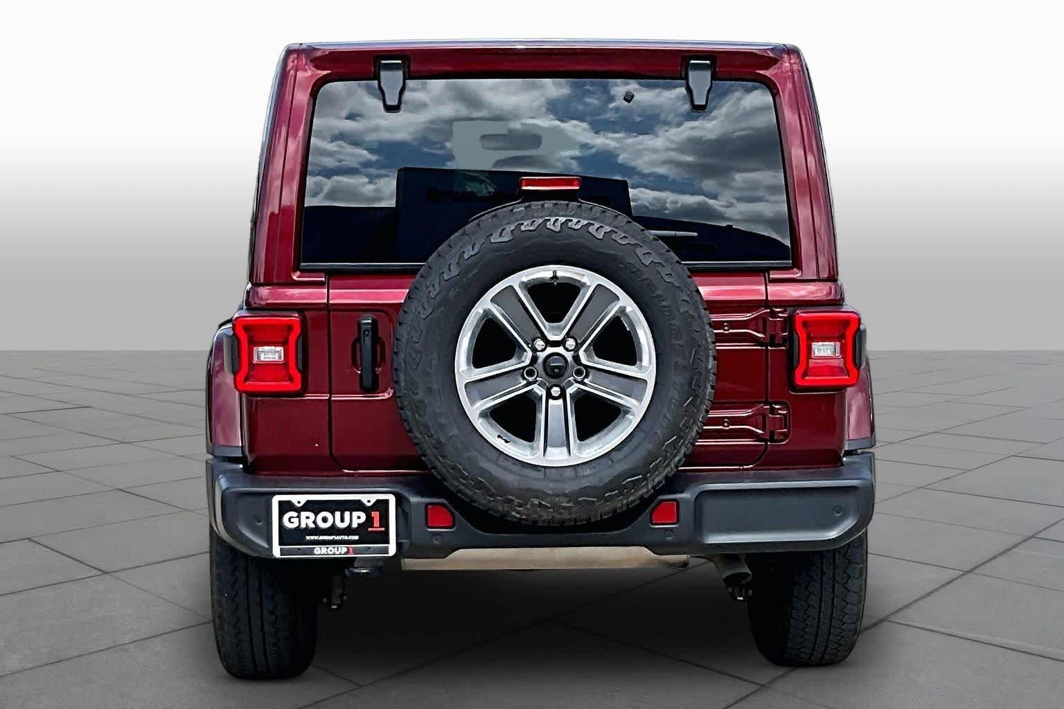 Used 2021 Snazzberry Pearlcoat Jeep Unlimited Sahara image 5