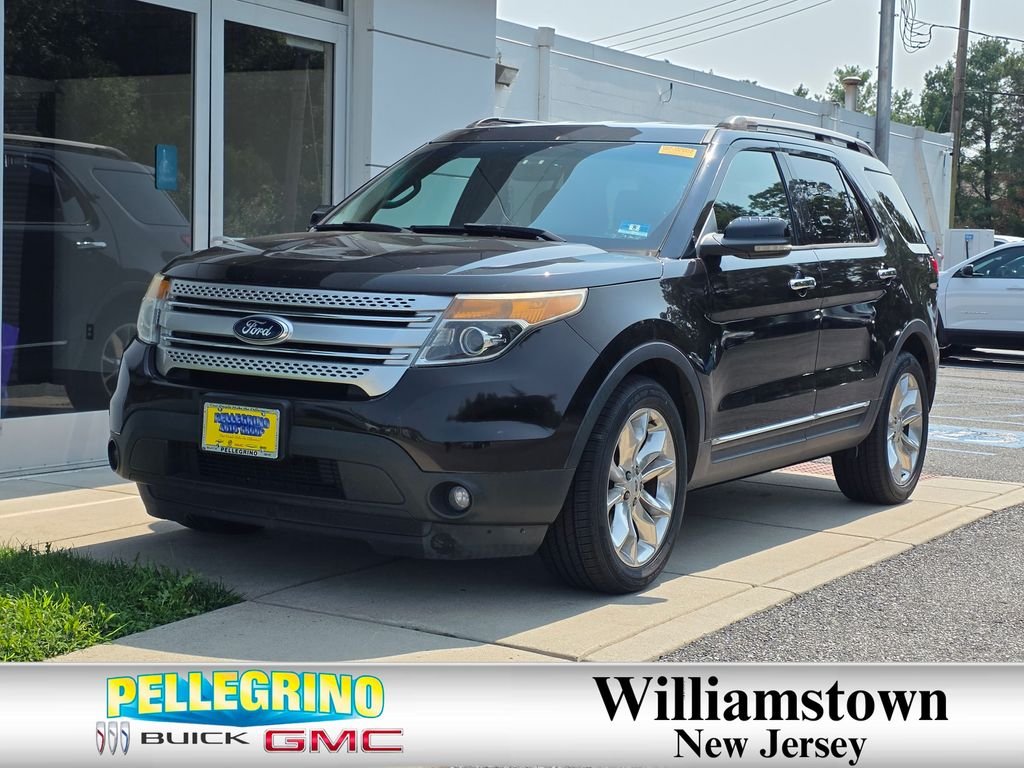 Used 2013 Brown Ford XLT image 1