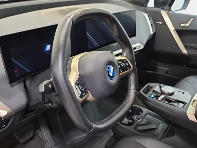 Used 2024 Black Sapphire Metallic BMW xDrive50 image 14