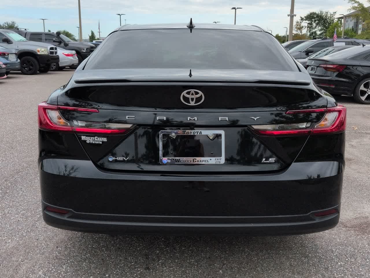 Used 2025 Midnight Black Metallic Toyota LE image 5