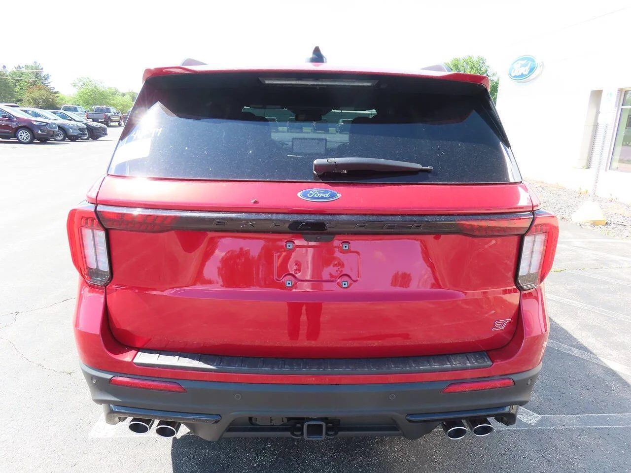 New 2026 Rapid Red Metallic Tinted Clearcoat Ford ST AWD 4dr SUV image 5