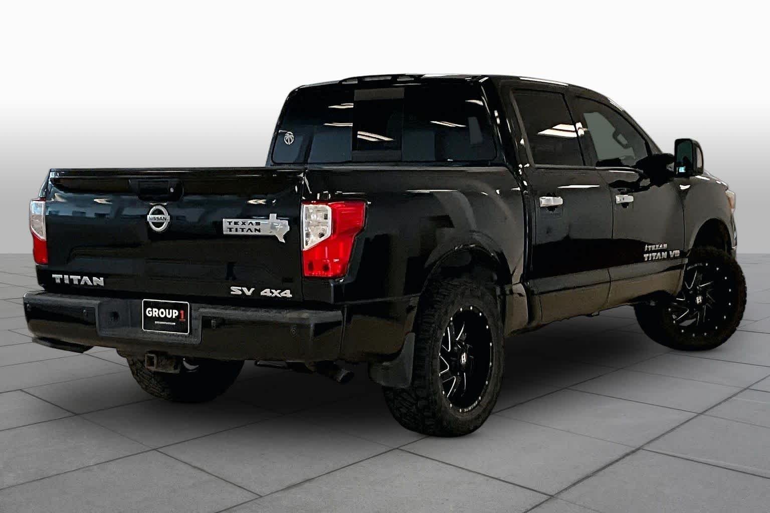 Used 2019 Magnetic Black Metallic Nissan SV image 12