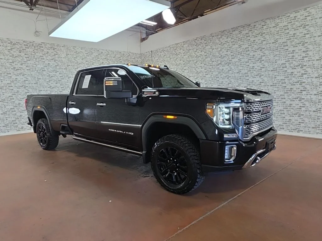 Used 2021 Ebony Twilight Metallic GMC Denali image 1