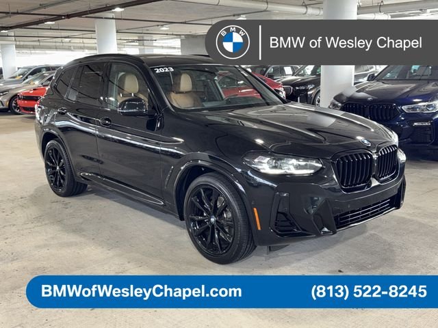 Used 2023 Black Sapphire Metallic BMW sDrive30i image 1