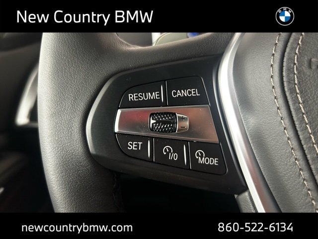 Used 2026 Skyscraper Grey Metallic BMW xDrive50e image 16
