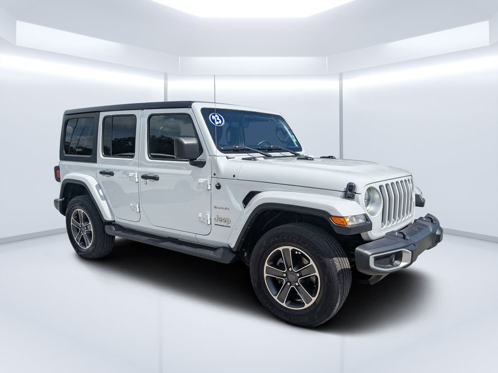 Used 2023 White/off-white Jeep Sahara image 1