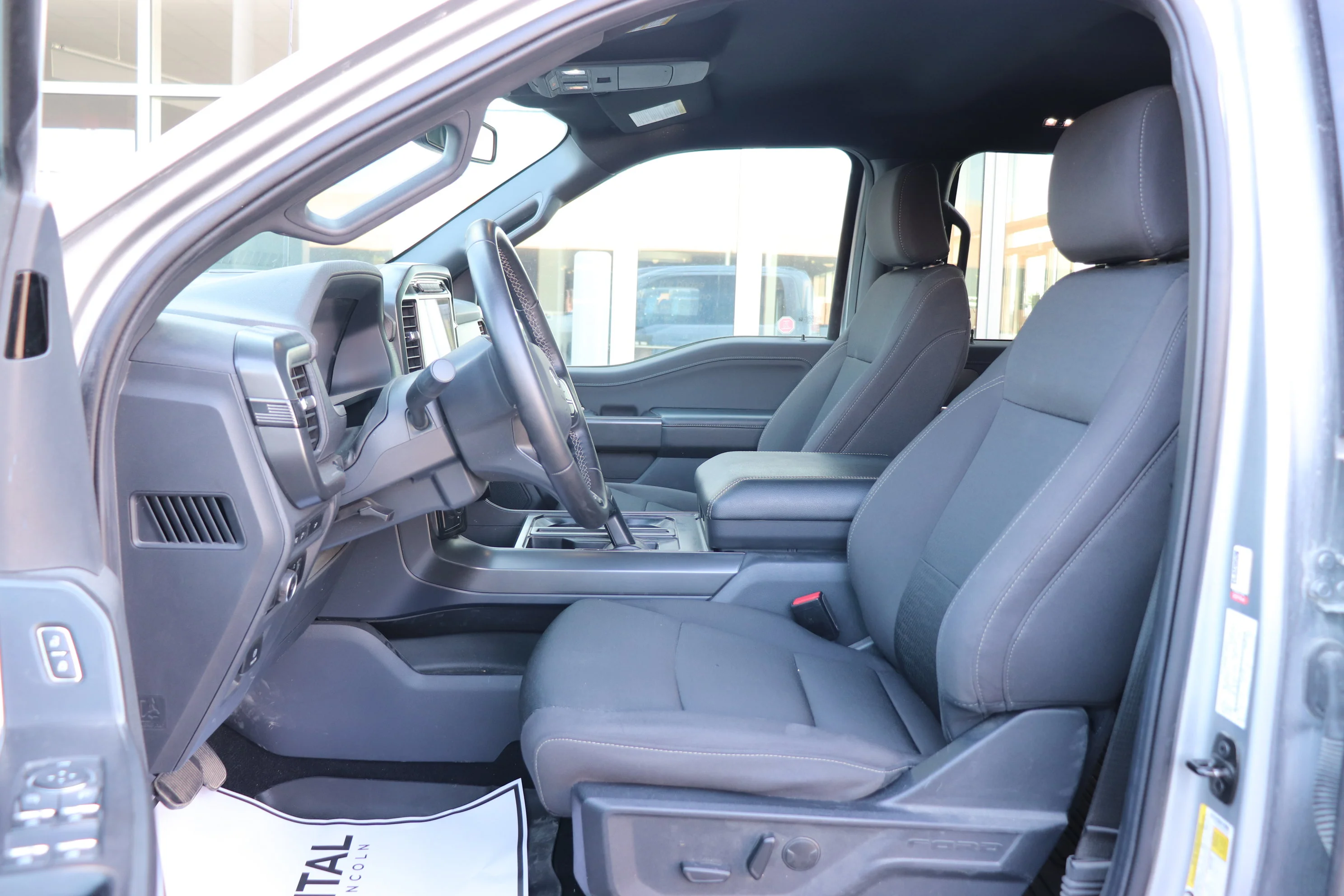Used 2024 Silver Ford XLT 4WD SuperCrew 5.5