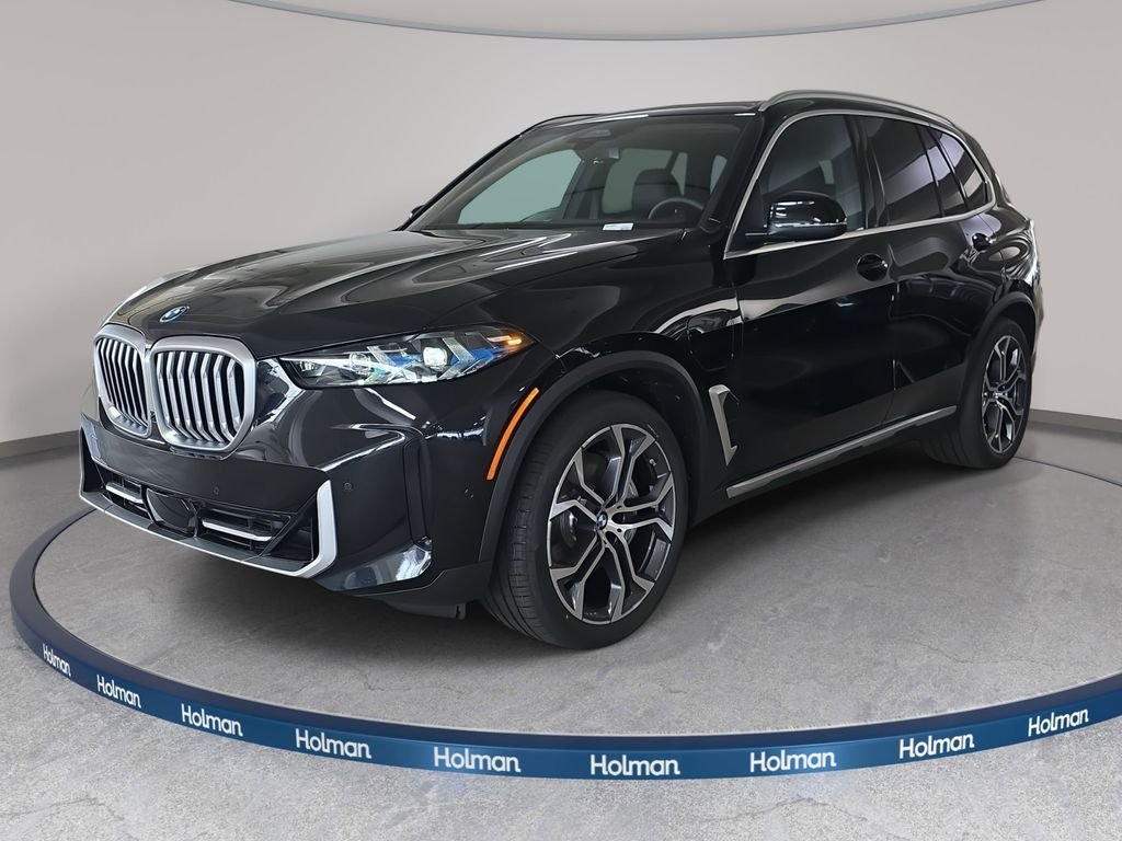 New 2026 Black Sapphire Metallic BMW xDrive50e image 1