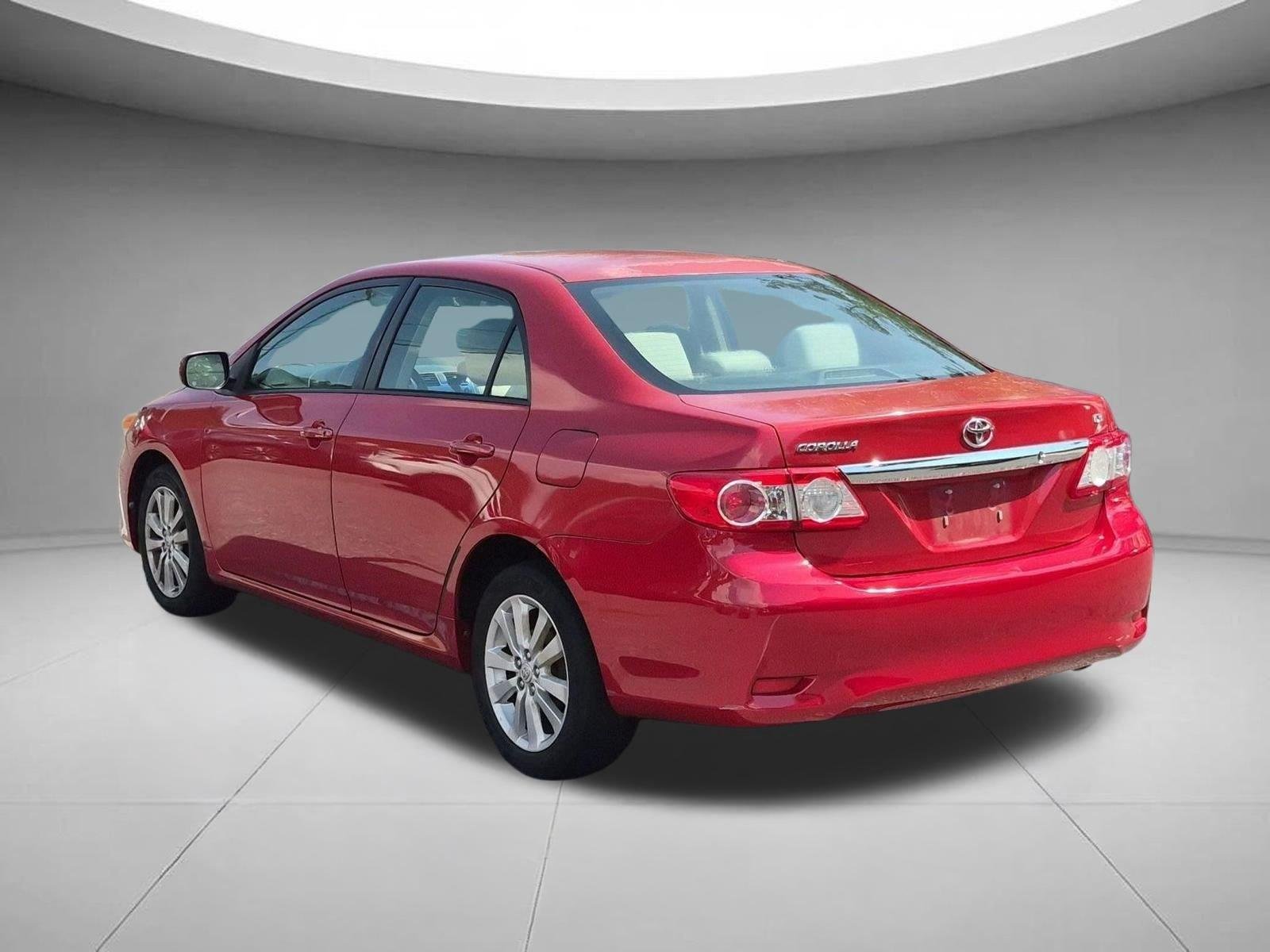 Used 2011 Barcelona Red Metallic Toyota LE image 3