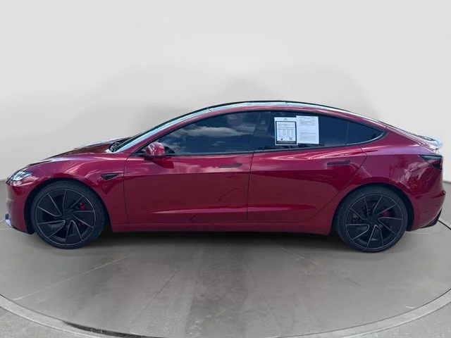 Used 2025 Ultra Red Tesla Performance image 2