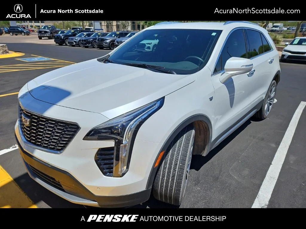 Used 2023 White Cadillac Premium Luxury image 1