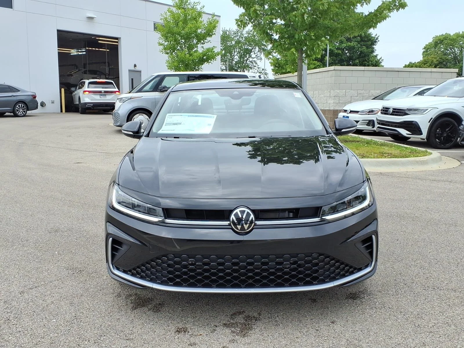 New 2026 Deep Black Pearl Volkswagen SEL AUTO image 2
